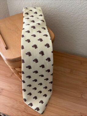Saddle Club cream Tie with Brown Dog Head Pattern